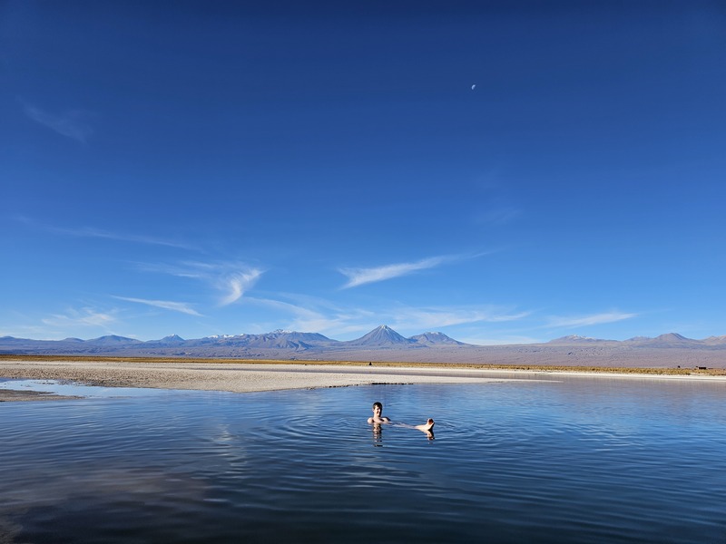 A swim in the Laguna Piedra in the Atacama desert