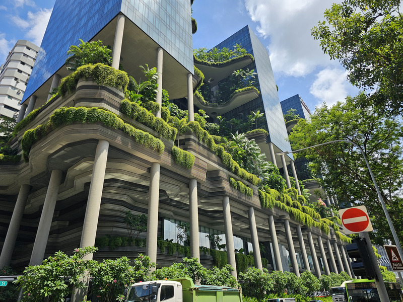 A building with plants on multiple levels