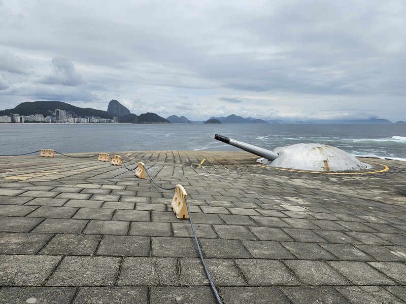 A view of Copacabana Beach past a fortress turret